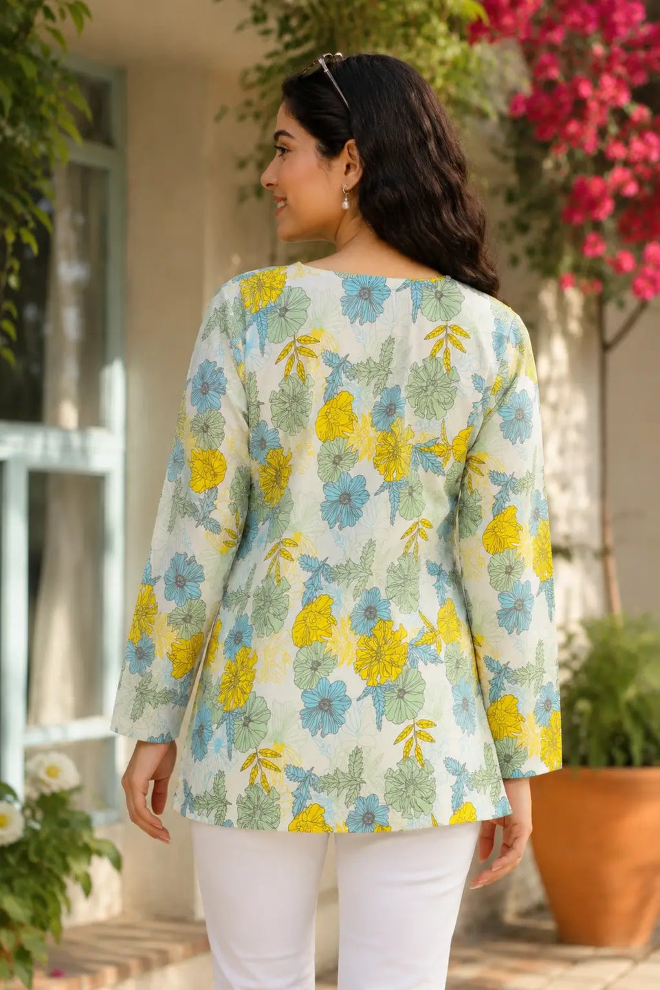 Back view of RABRIC floral printed casual women’s top with relaxed fit and full sleeves