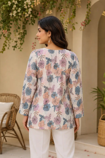 Back view of RABRIC floral printed casual top for women in soft pastel colors