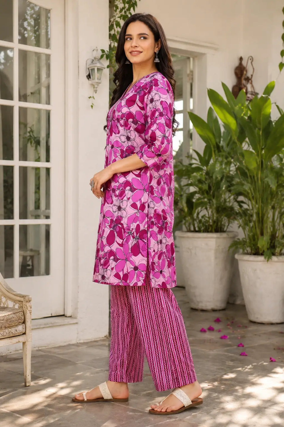 Side angle women floral cotton kurta and pant ethnic co-ord set with elegant straight fit silhouette by Rabric
