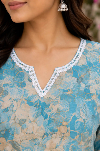 Close up neck design of blue floral cotton short top with white lace detailing for women