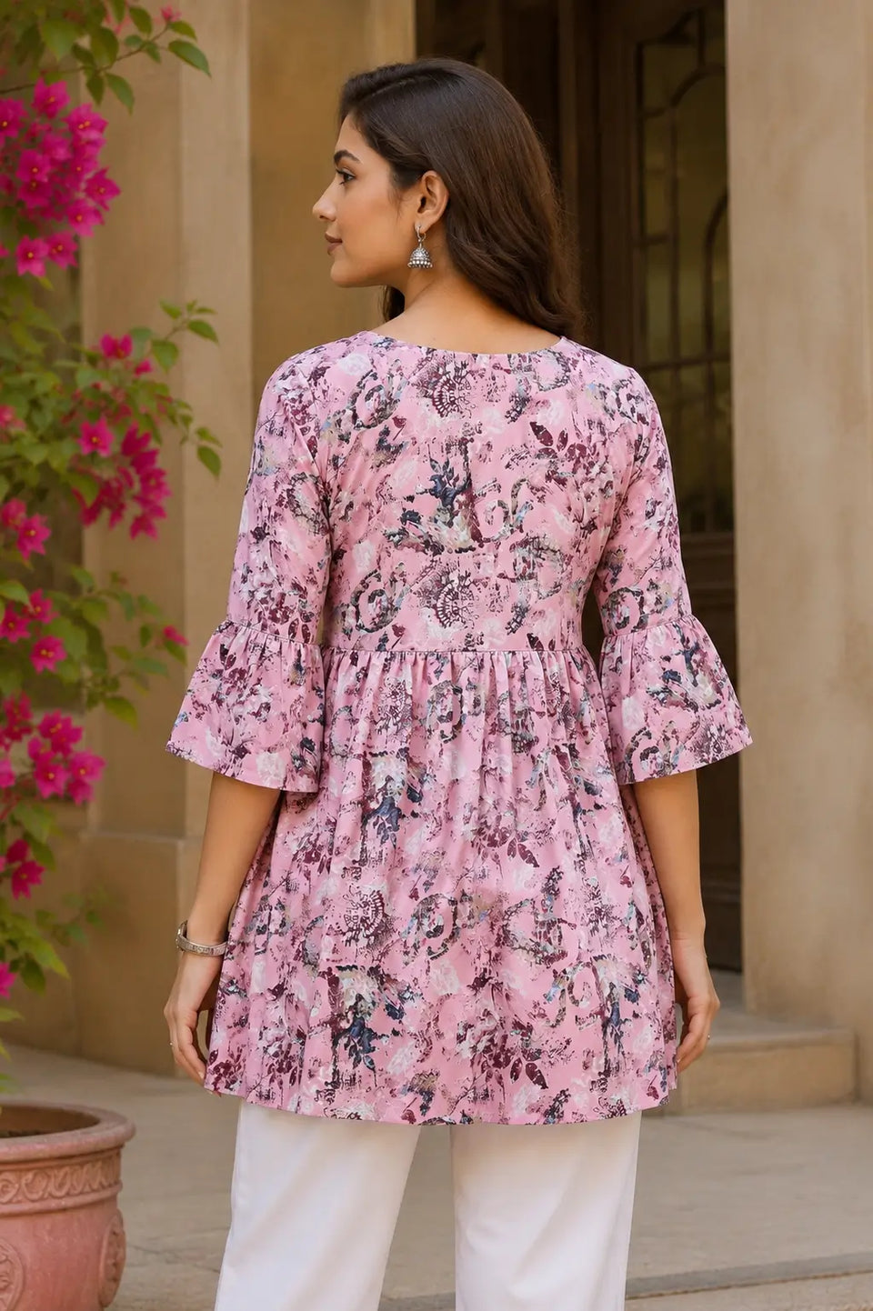 Back view of Rabric pink floral crepe short top for women with flared silhouette and 3/4 sleeves