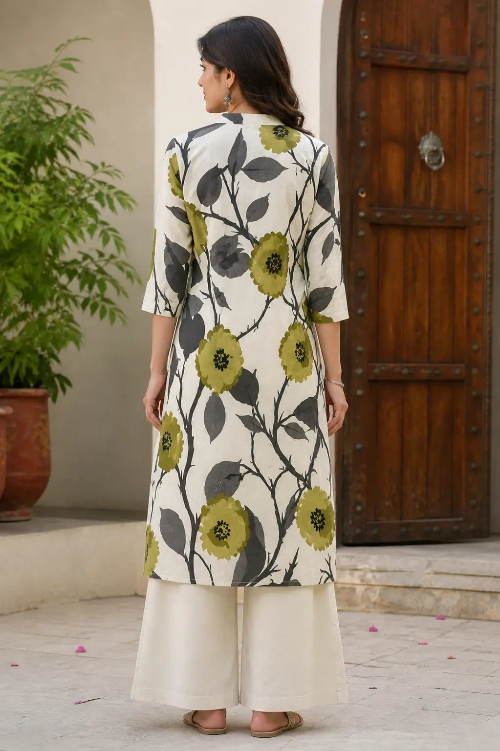 Back view of women’s off-white floral printed cotton flex kurta pant set by Rabric