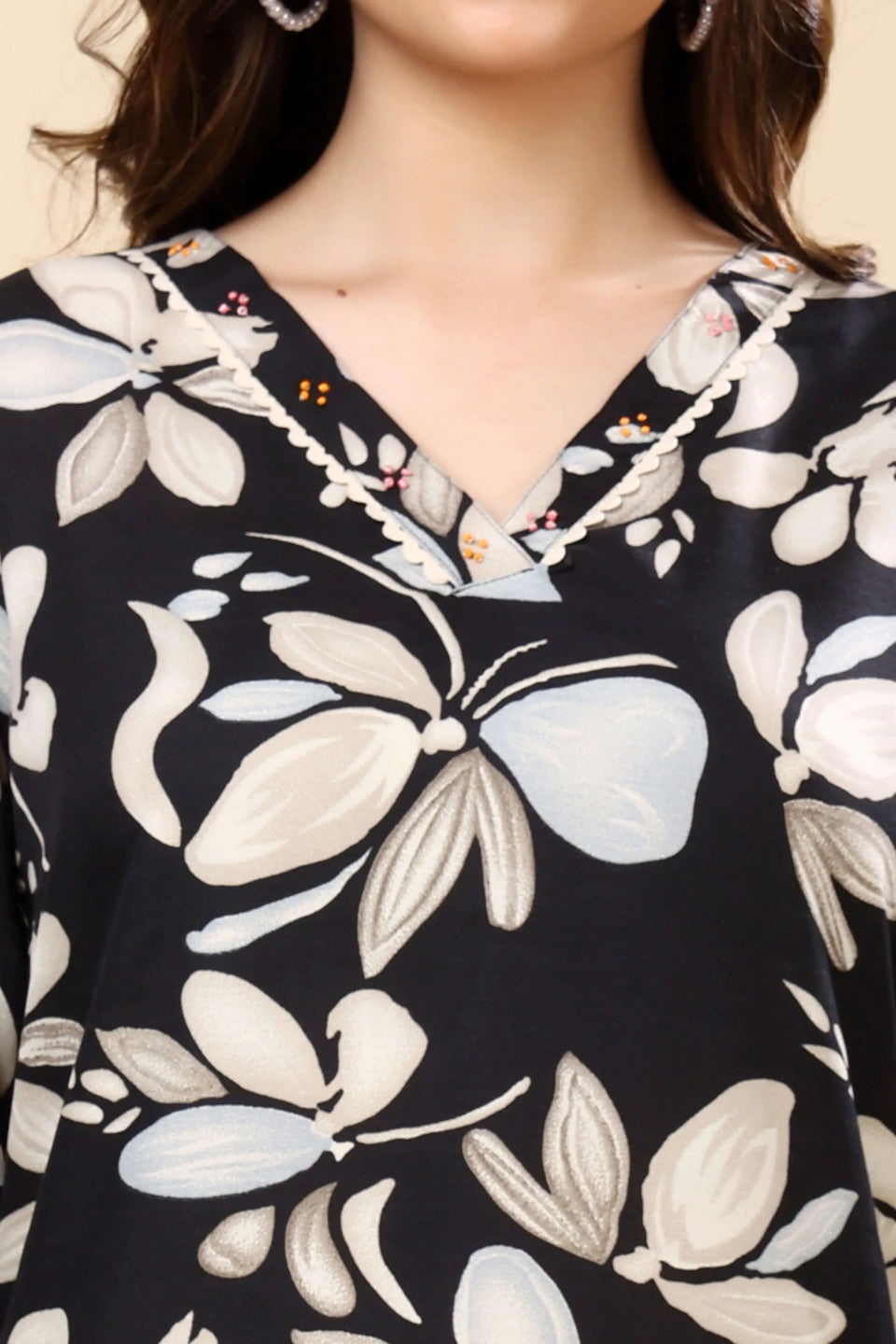 Close-up of Floral Print on Black Cotton Slub Fabric