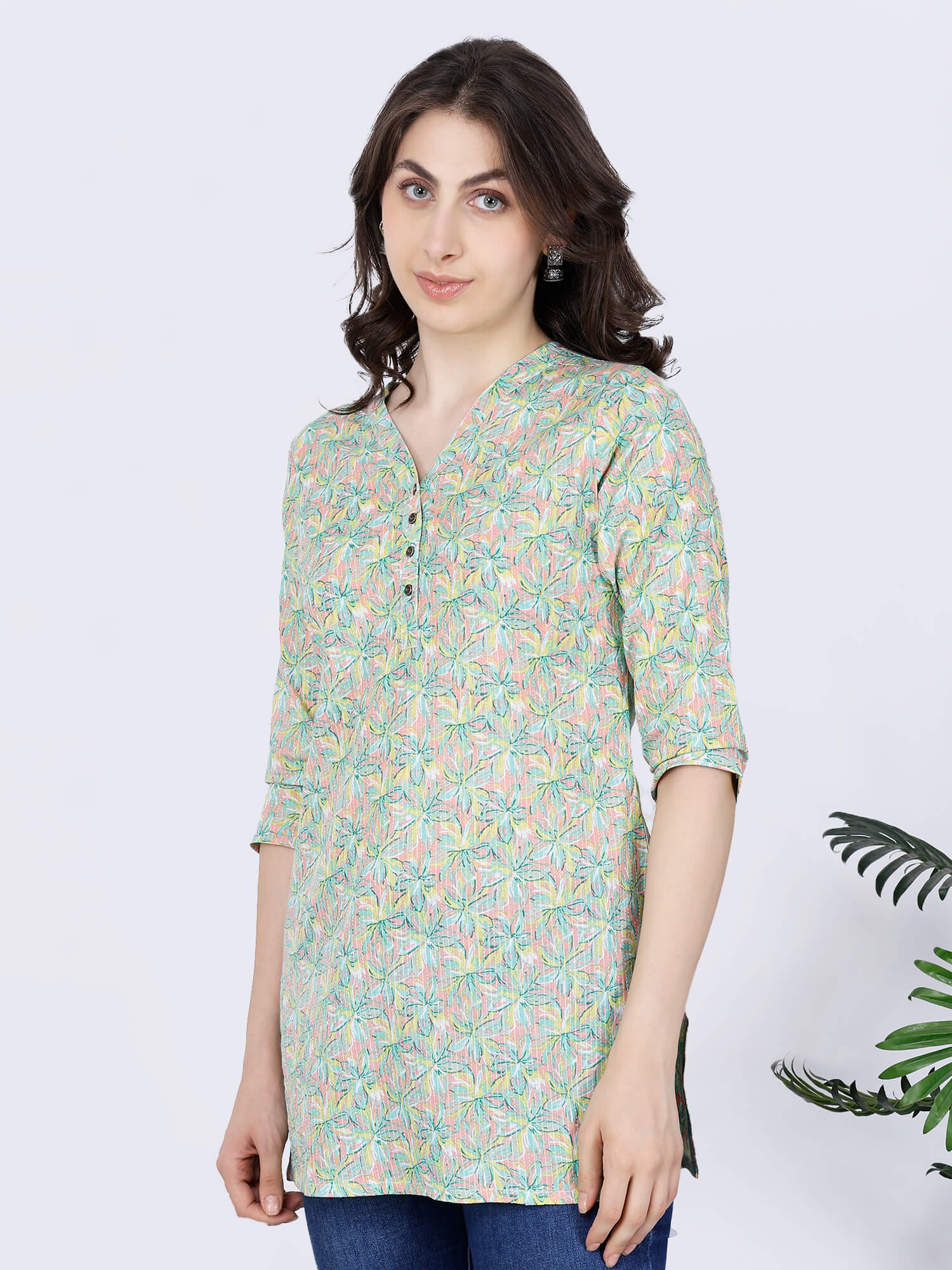Side view of pastel floral printed short kurti for women