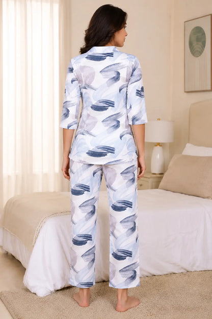 Back view of Rabric glace cotton women night suit in blue and white abstract print with comfortable pajama co-ord set