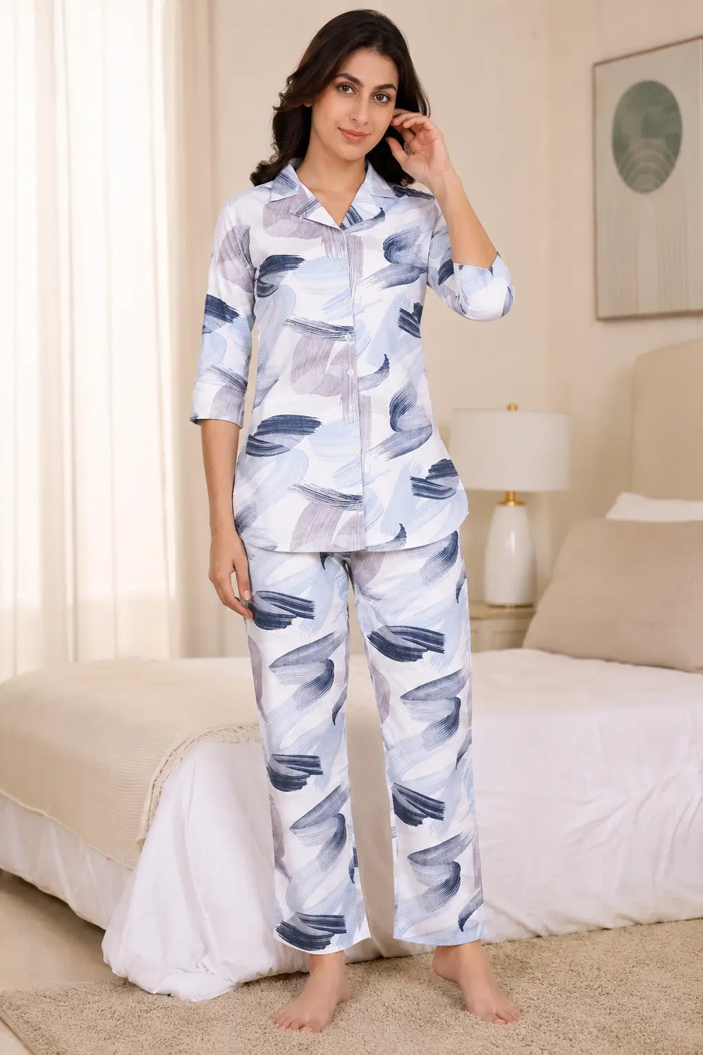 Rabric women glace cotton blue and white abstract print co-ord night suit front view with 3/4 sleeves and straight fit pajama set