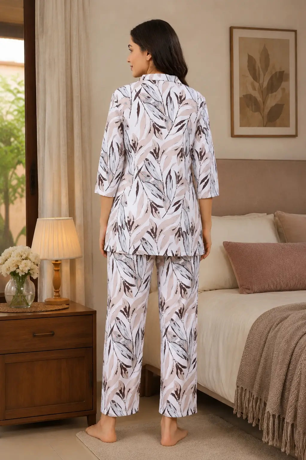 Back view of Rabric women glace cotton leaf print night suit co-ord set in soft beige color with relaxed fit pajama pants