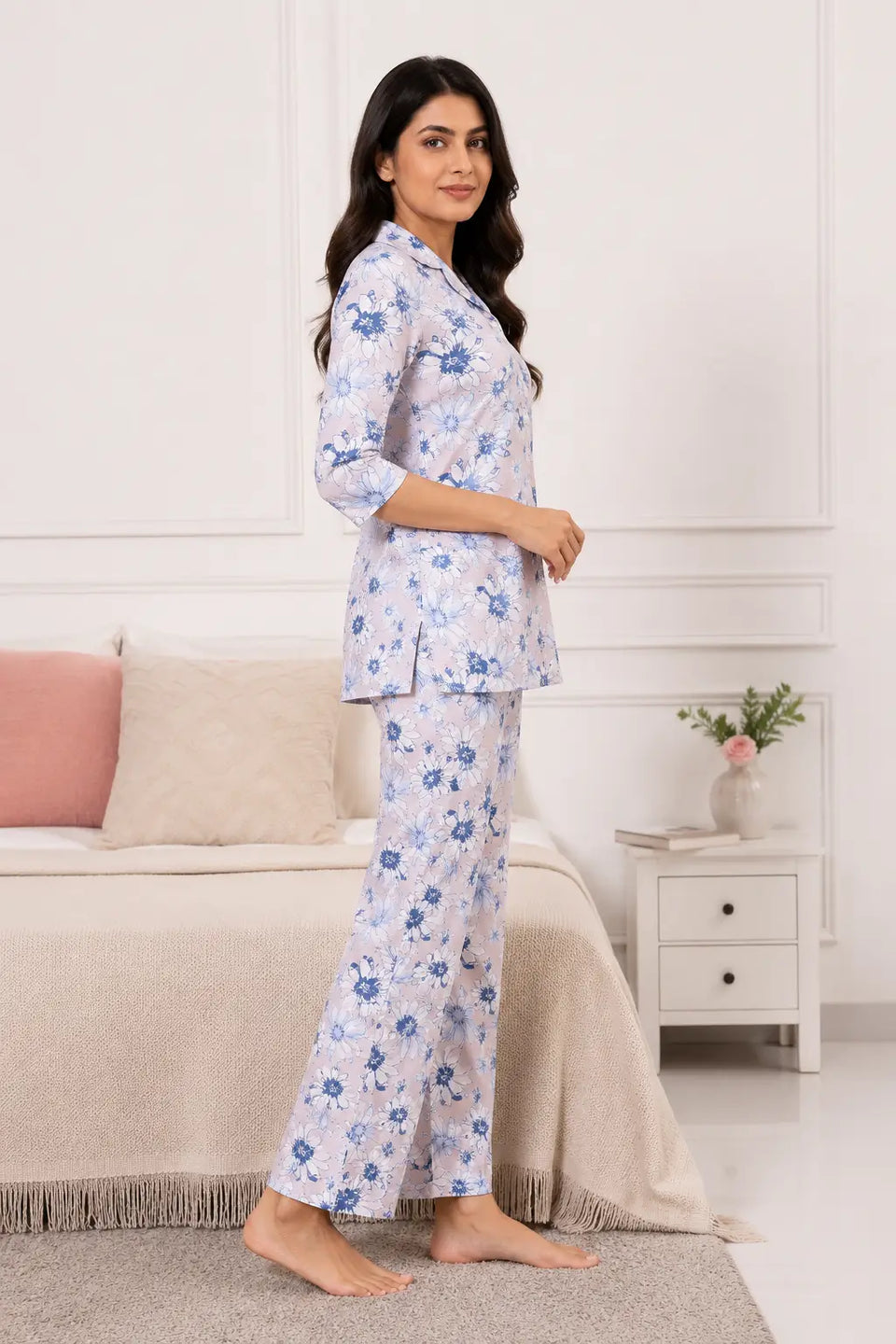 Side angle view of Rabric glace cotton lilac floral pajama co-ord set for women with elegant 3/4 sleeves and straight fit pants
