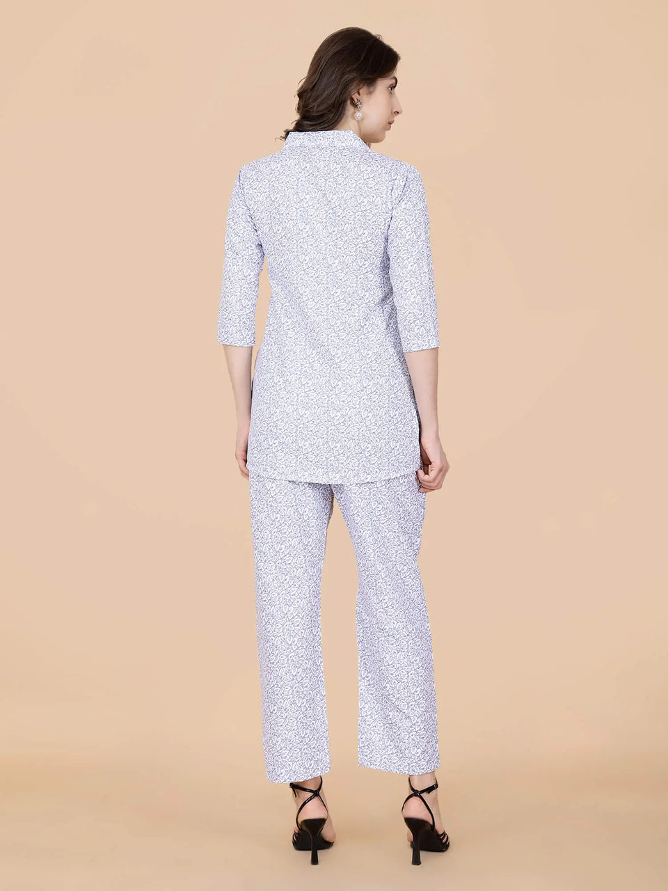 Back view of soft white floral printed co-ord set by Rabric