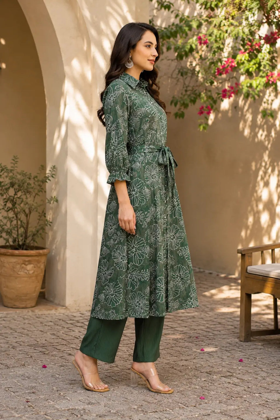 Side angle view of Rabric women vertical silk floral co-ord set with full-length kurta