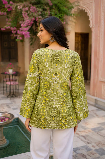 Back view of RABRIC green ethnic printed top for women with relaxed fit sleeves