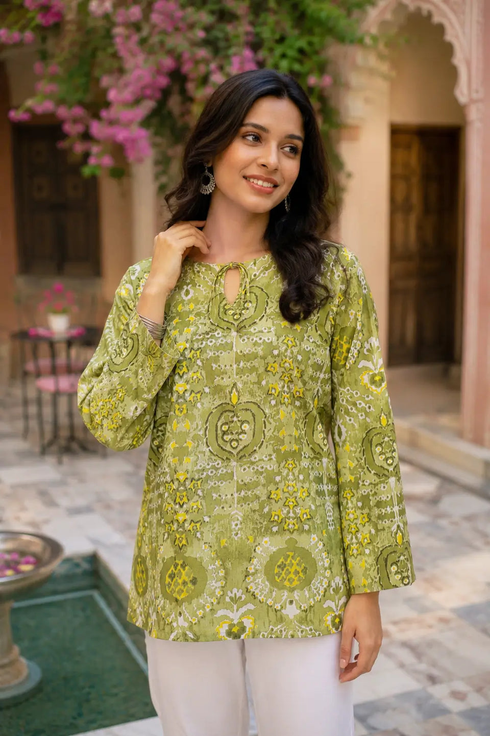 RABRIC women green printed lawn kurti front view with white trousers casual summer outfit