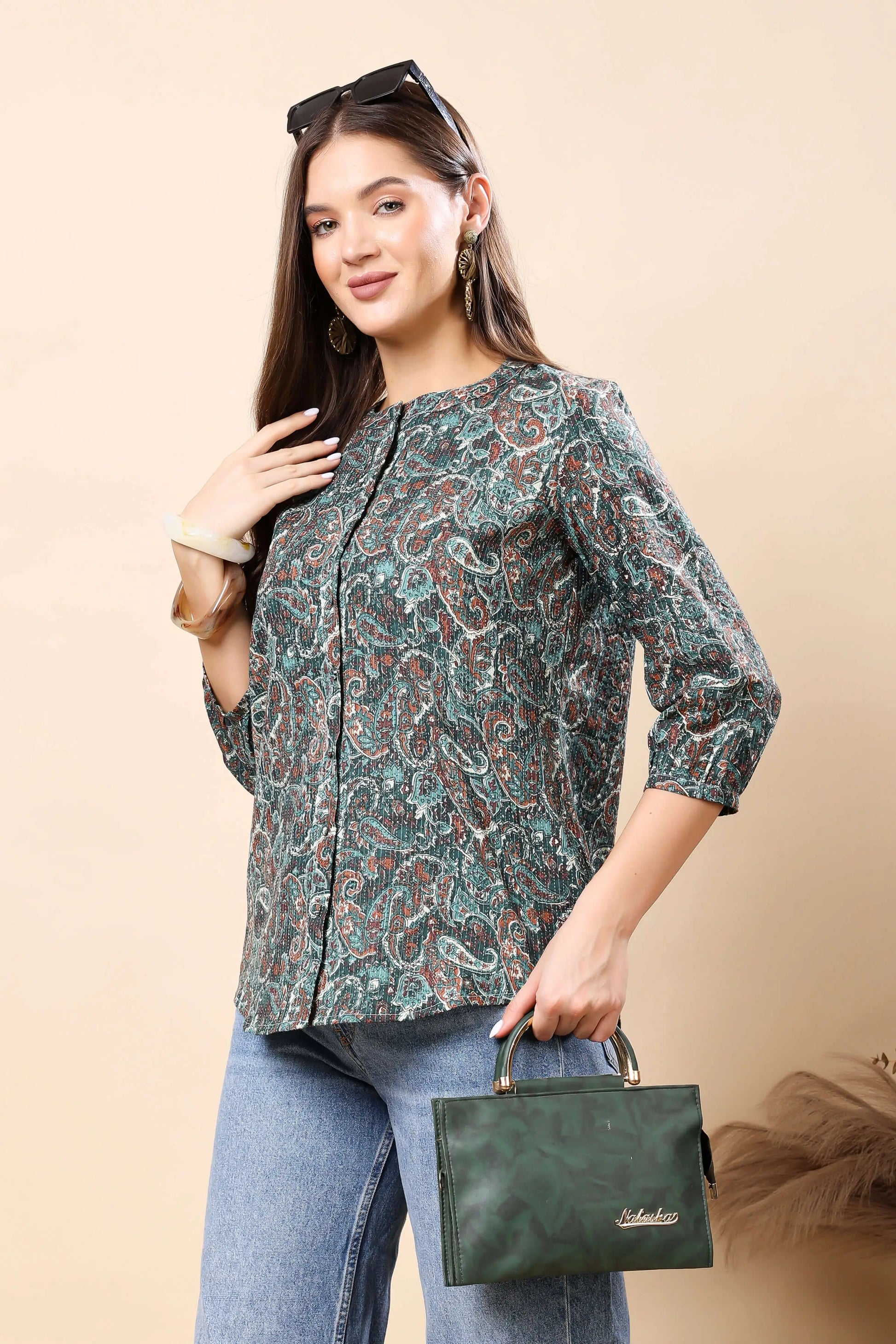 Women styling Rabric green short top with denim jeans