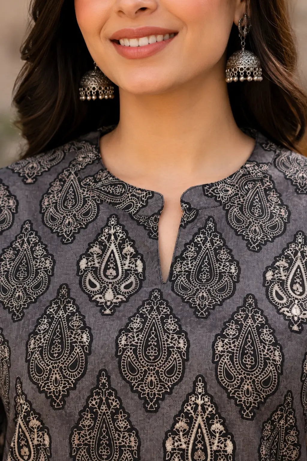 Close up neck design of Rabric grey cambric printed women kurti with stylish round slit neckline and ethnic print detailing
