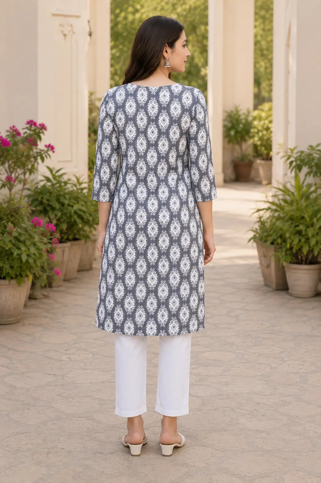 Back view of Rabric grey rayon printed kurta pant set for women with straight fit ethnic wear design