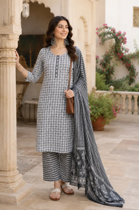 Rabric grey white cotton kurta pant set with dupatta for women featuring long straight kurta with 3/4 sleeves and ethnic printed design front view