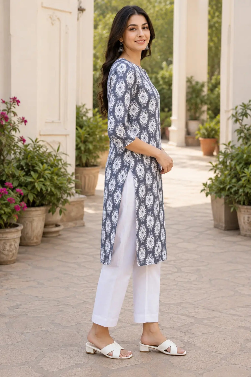 Side angle of Rabric grey and white rayon kurta pant set for women with 3-4 sleeves and straight fit style
