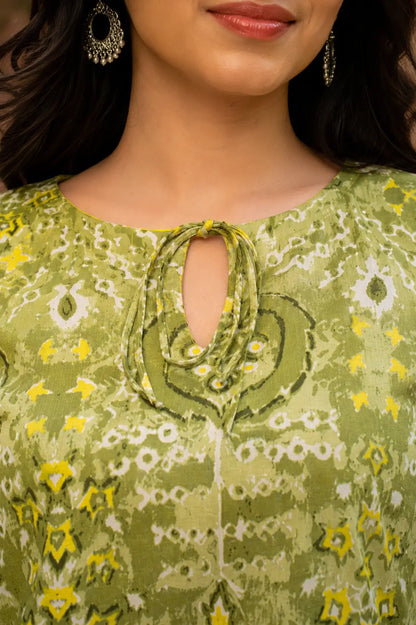 Closeup of RABRIC green printed kurti featuring keyhole neckline and soft fabric