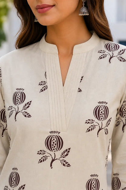 Close-up of V-neck pintuck design on Rabric beige cotton flex kurta