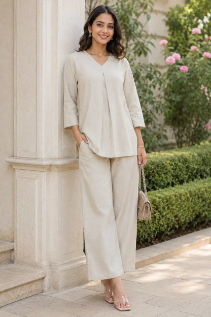 Rabric light beige cotton co-ord set for women casual day out styling with solid V-neck top and wide pajama pants
