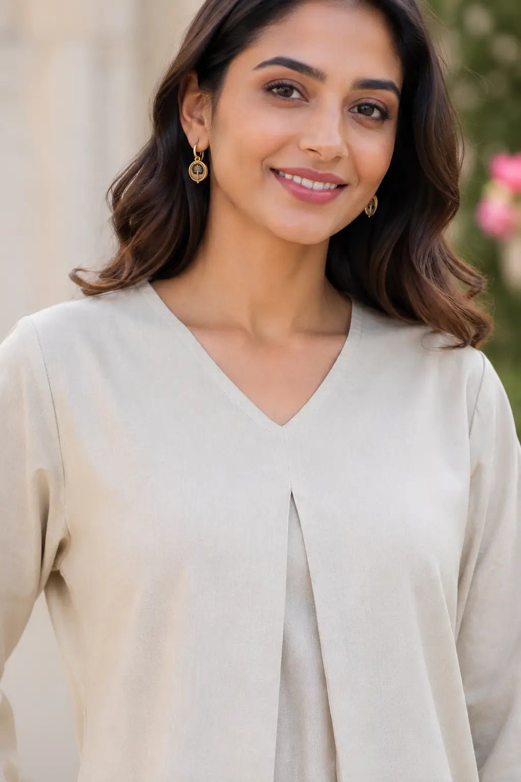 Close-up of Rabric light beige cotton co-ord set V-neck design with front pleat detail and solid woven texture