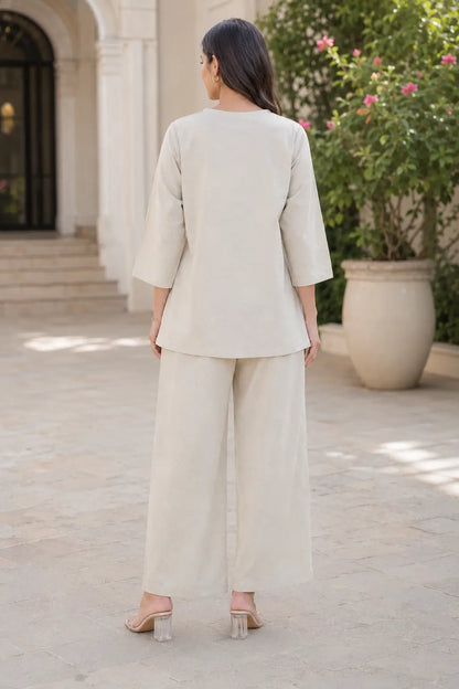 Rabric light beige cotton solid co-ord set back view showing plain cotton top and wide pajama for women