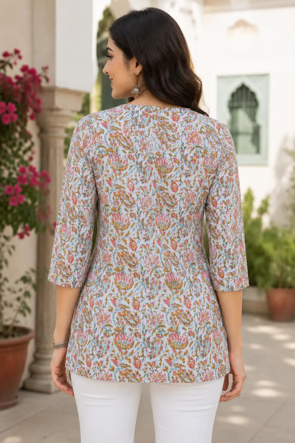 Back view of Rabric women light blue floral cotton mid length top with 3-4 sleeves casual summer wear