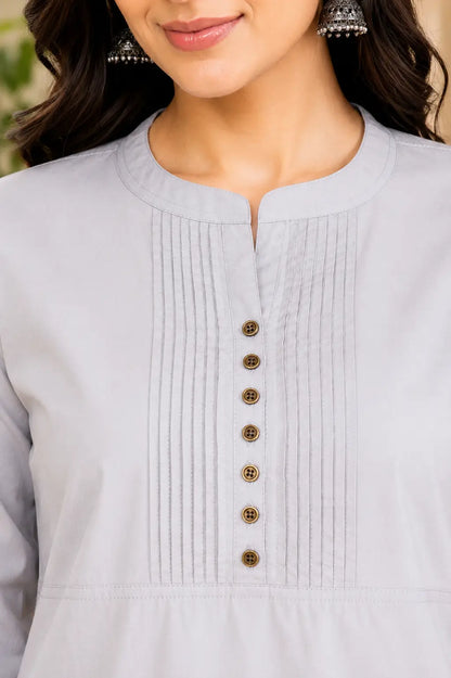 Close up neck design of Rabric light grey popline cotton kurti featuring pintuck detailing and button placket