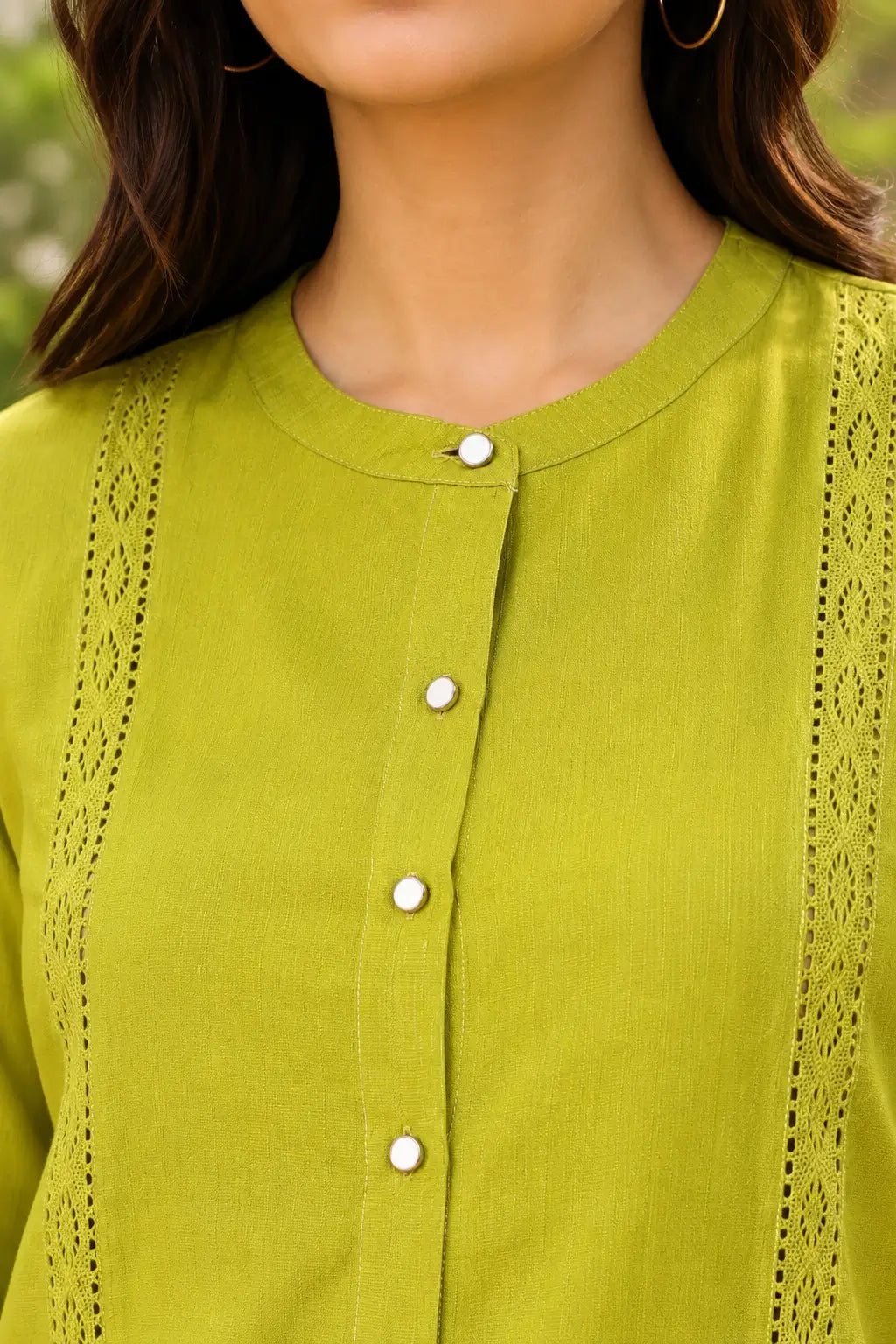 Rabric lime green vertican silk co-ord set neck design close-up with round collar, white button placket and elegant lace panel detailing