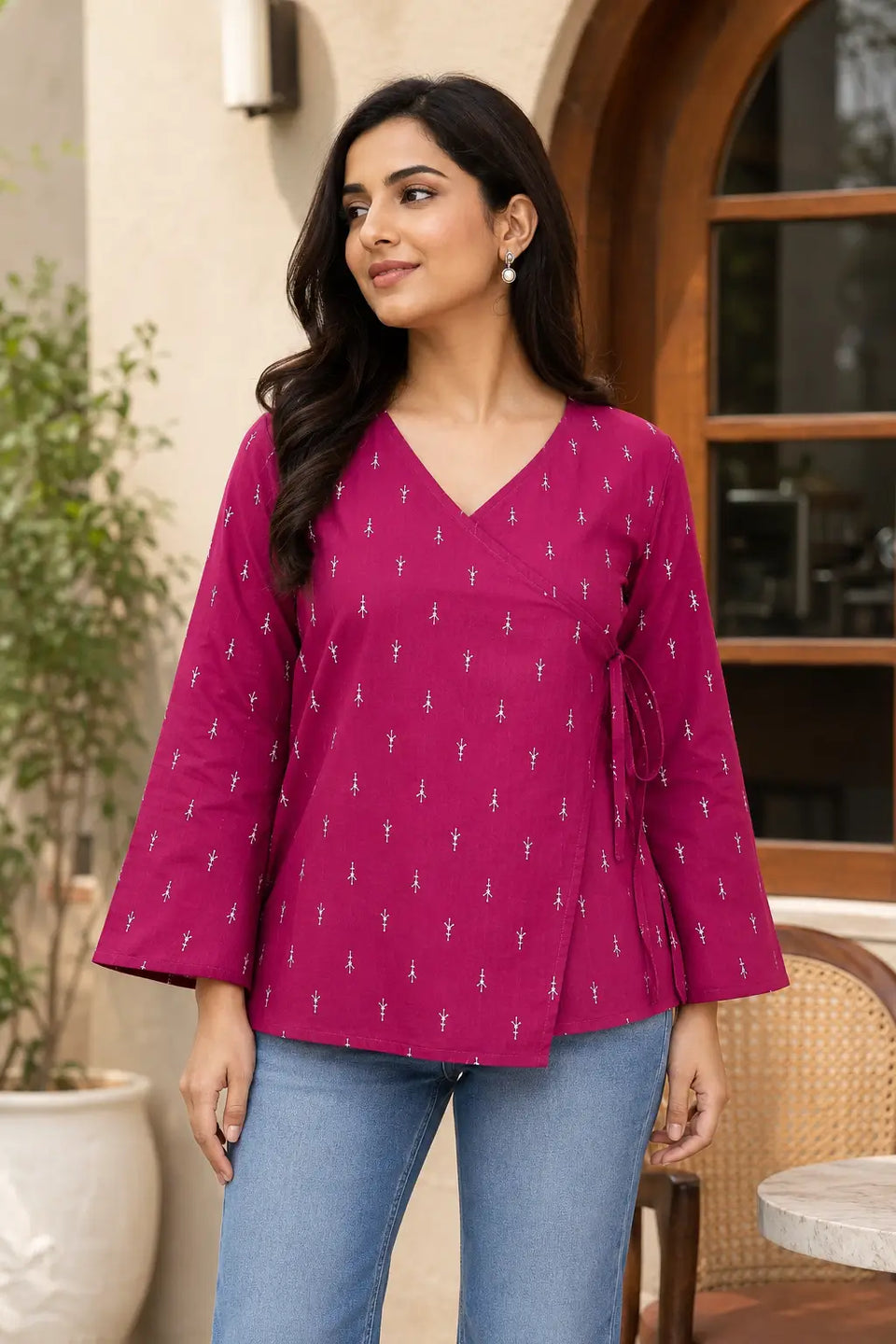 Rabric magenta cotton wrap style short top with white buti print paired with denim for office casual outfit