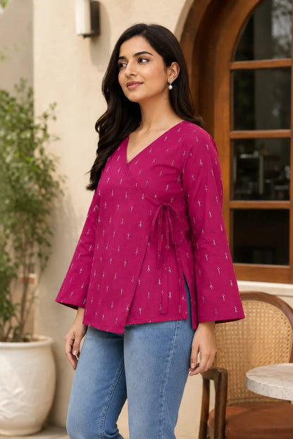 Side dori tie design detail on Rabric magenta cotton wrap short top with white buti print and bell sleeves