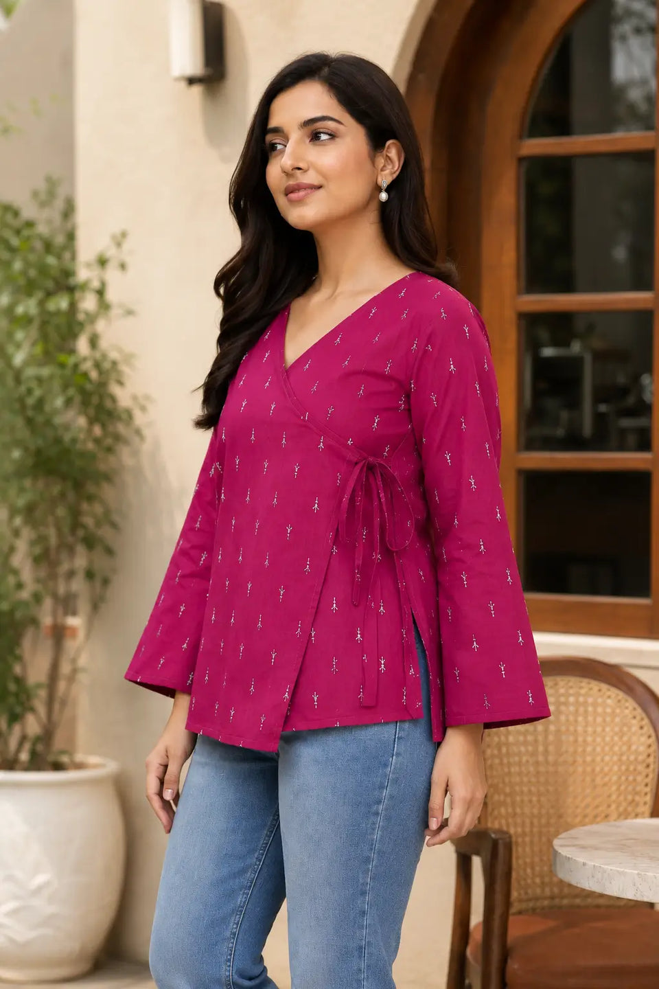 Side dori tie design detail on Rabric magenta cotton wrap short top with white buti print and bell sleeves