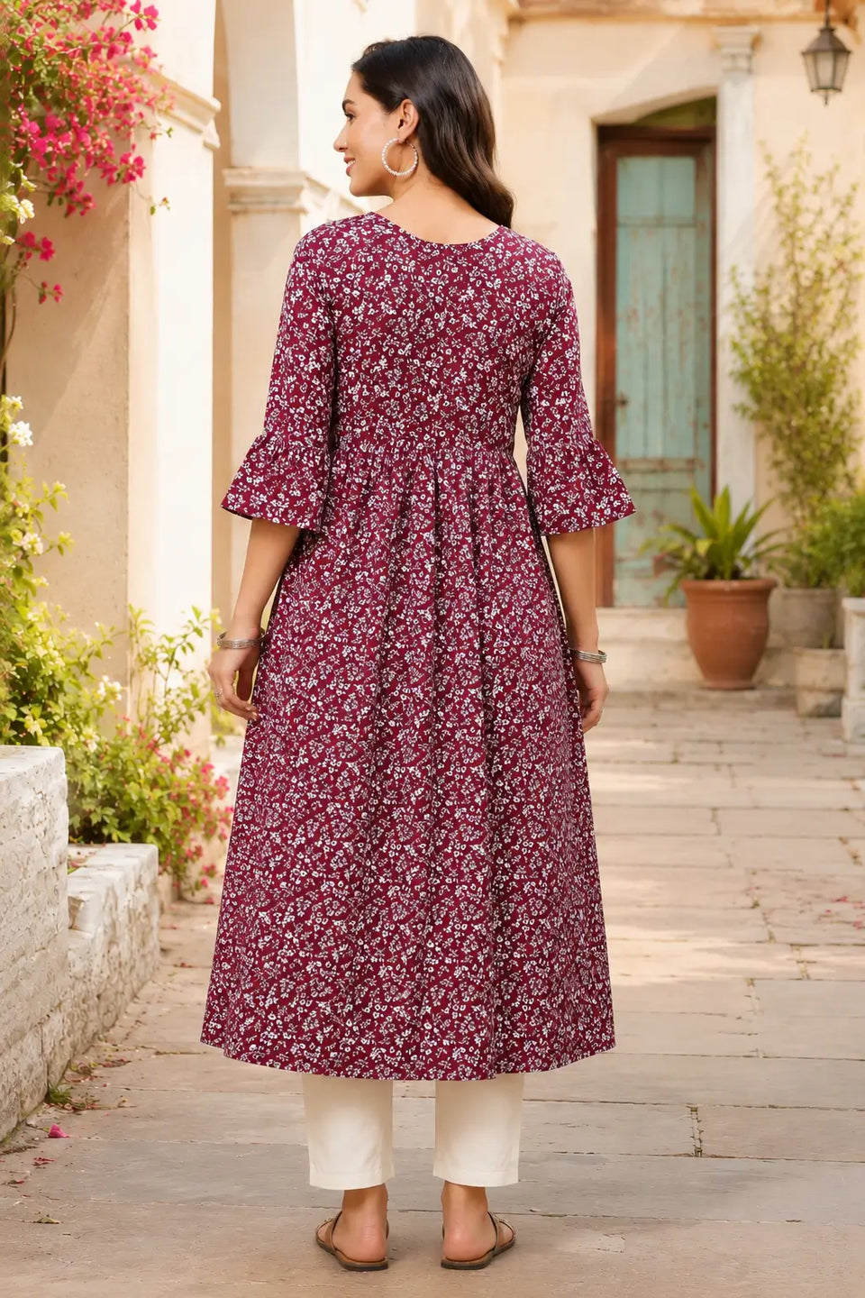 Back view of Rabric maroon floral crepe women kurti with elegant flare and 3-4 sleeves ethnic casual wear