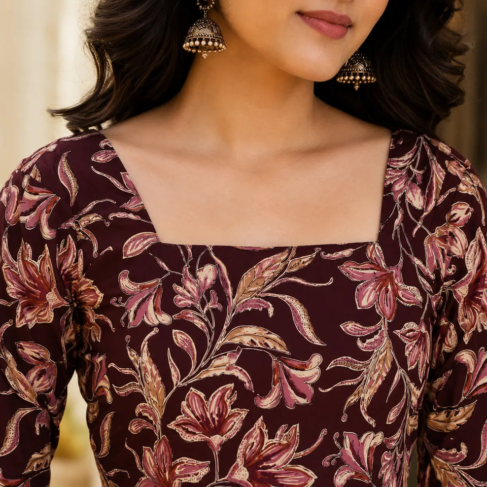 Closeup of square neck design on Rabric maroon floral print cotton short top for women with elegant floral botanical pattern.