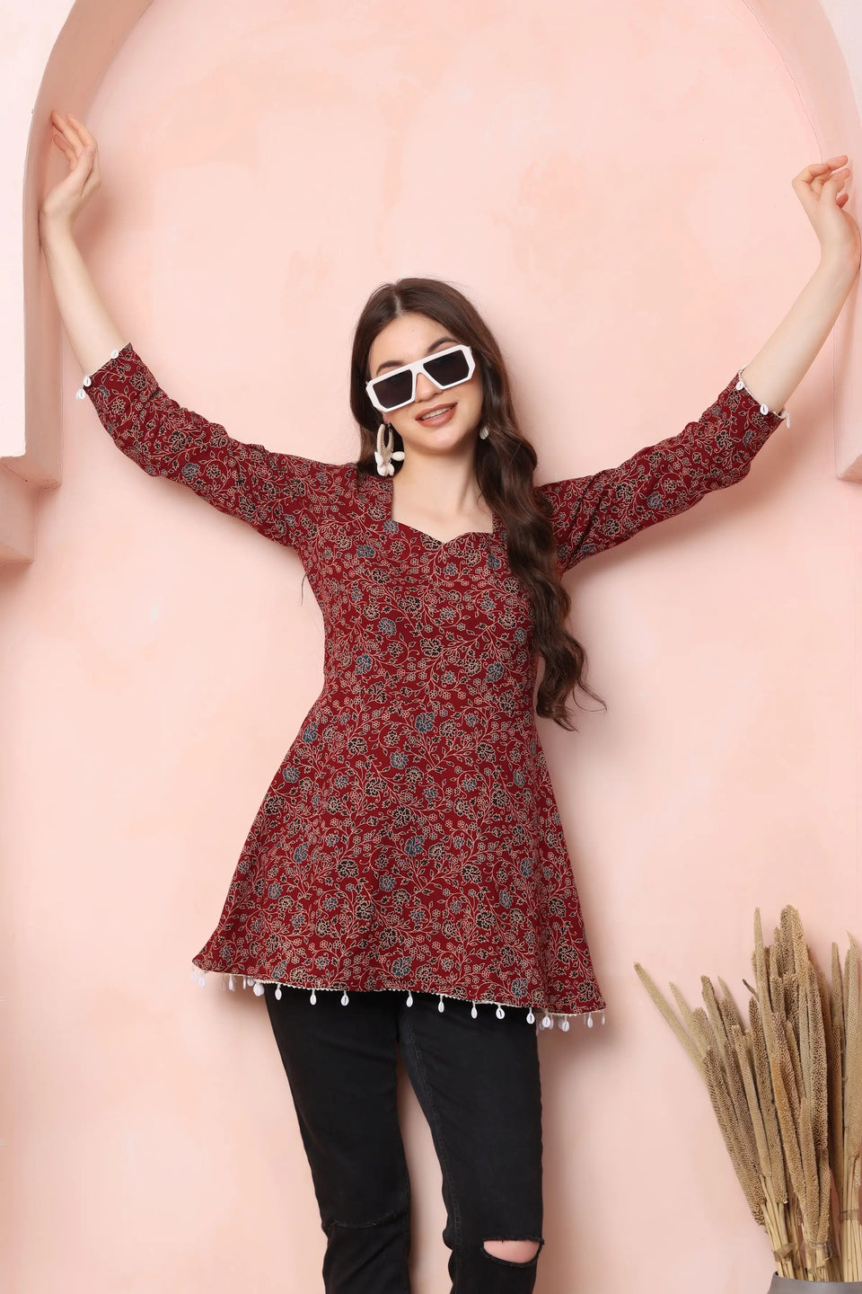 RABRIC maroon pure cotton flared short kurti for women styled with black bottoms for an everyday look