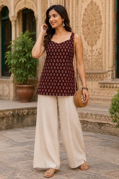 Rabric maroon pure cotton sleeveless short top for women with ethnic paisley leaf print, sweetheart neck and comfortable hip length design front view
