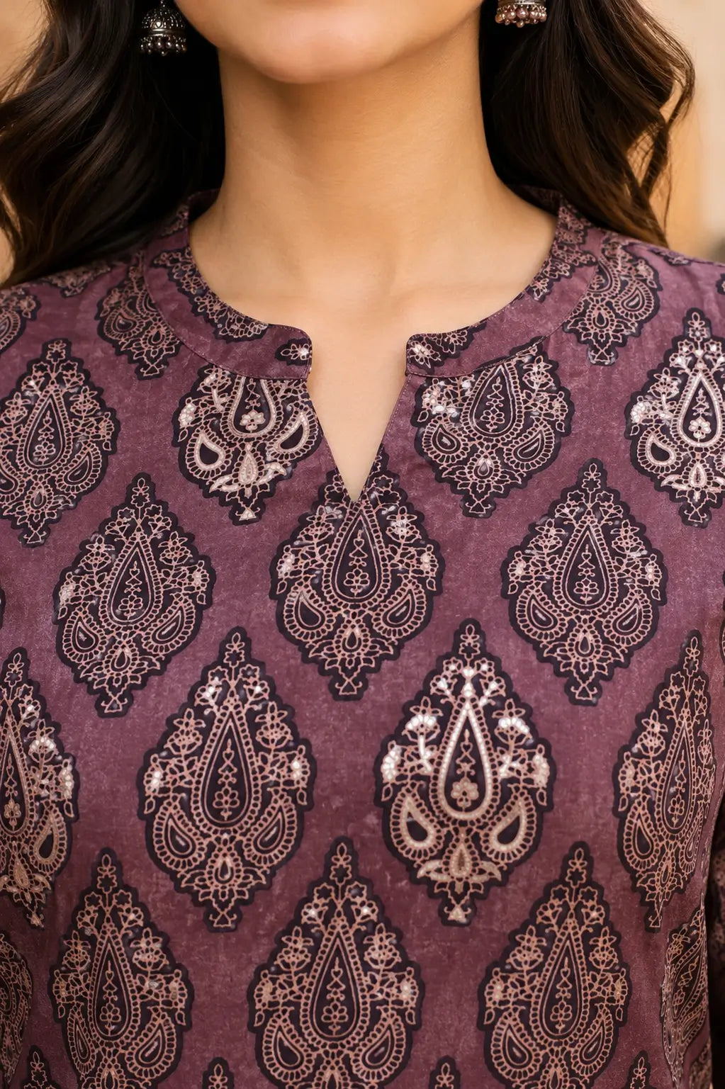 Close up of stylish neck design on Rabric mauve cambric cotton printed women kurti