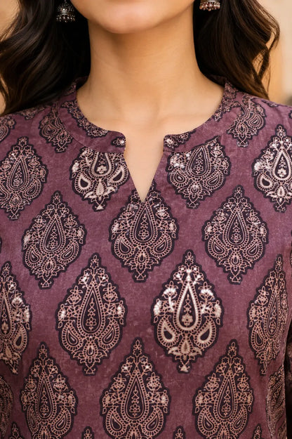 Close up of stylish neck design on Rabric mauve cambric cotton printed women kurti