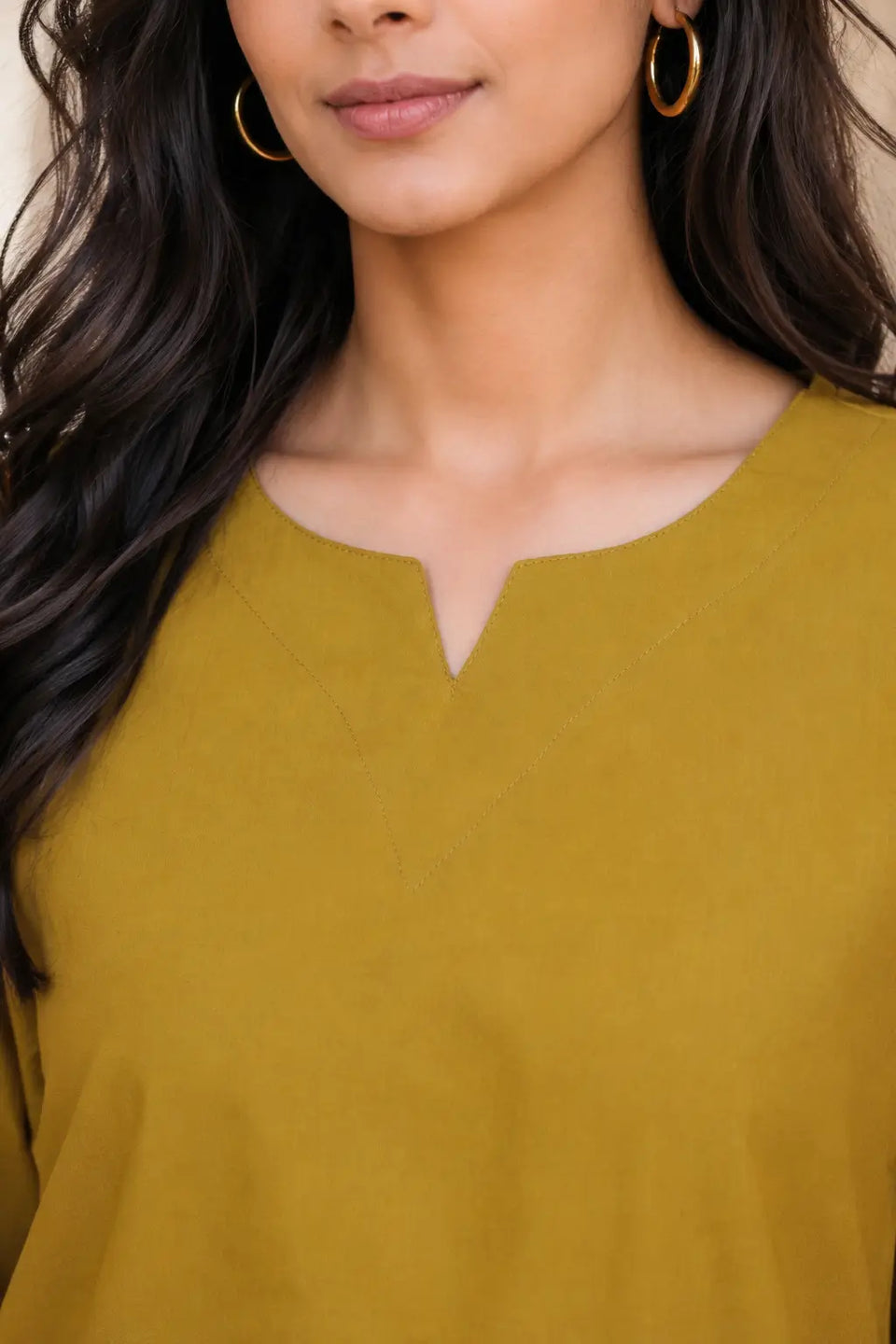 Rabric mustard olive cotton co-ord set neck design close up with small notch neckline and clean stitch detailing