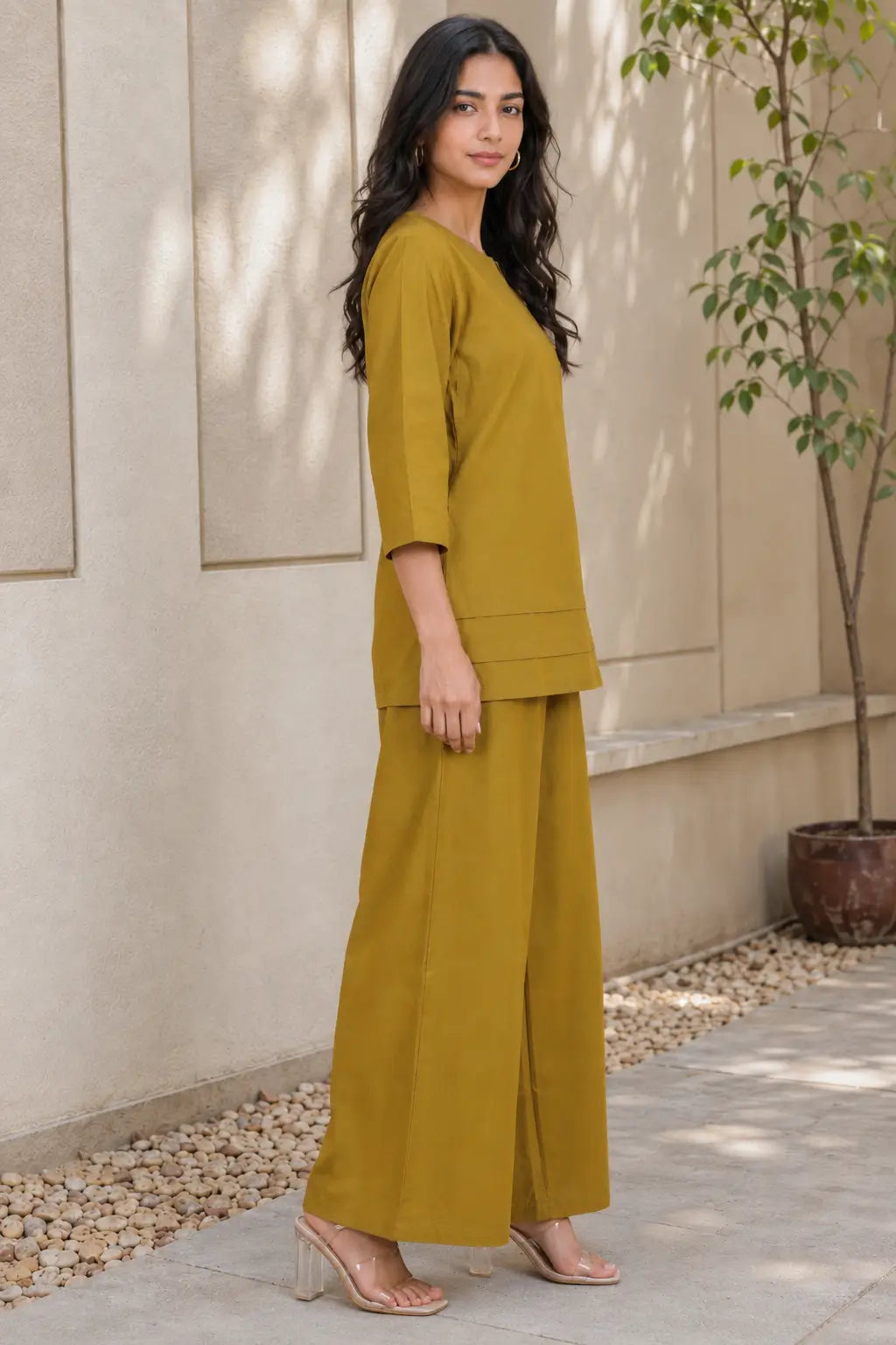 Rabric mustard olive solid cotton co-ord set side view showing 3/4 sleeve tunic top and relaxed palazzo pants