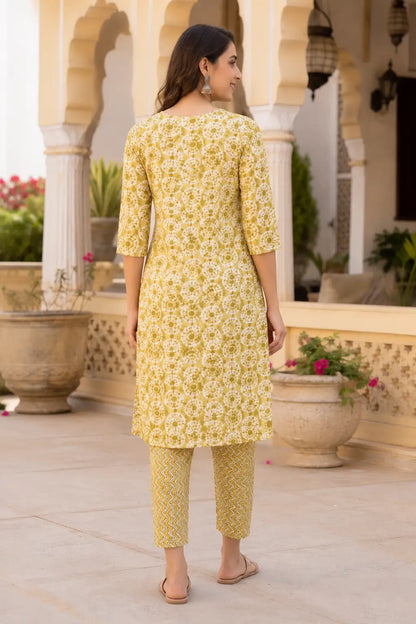 Back view of Rabric mustard yellow rayon kurta pant set for women with printed straight fit kurta and matching pants