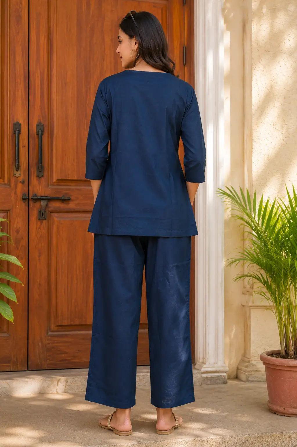 Back view of Rabric navy blue cotton co-ord set for women with plain solid top and wide-leg pajama