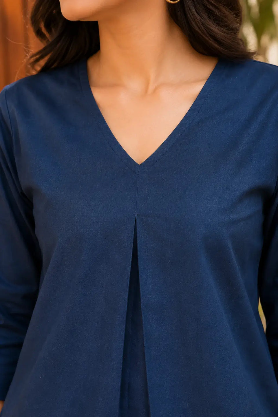Close-up of Rabric navy blue cotton co-ord set V-neck design with front pleat detailing in soft cotton fabric