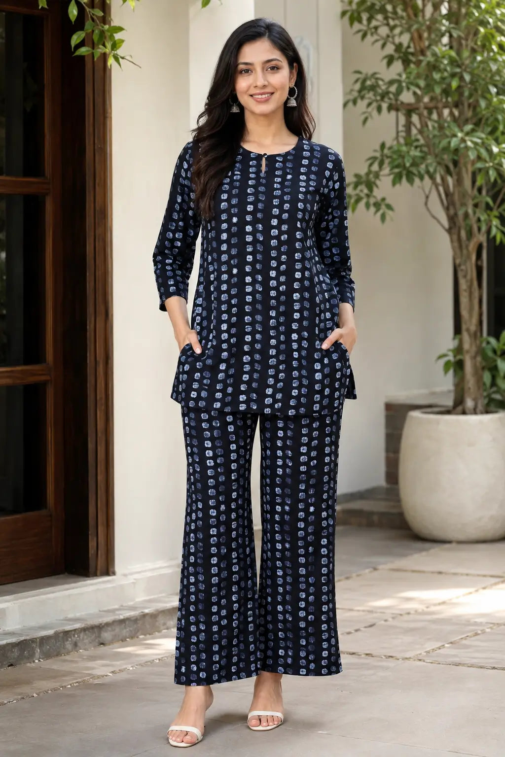 Rabric navy blue cotton co-ord set for women with light blue abstract dot print, short top, three-quarter sleeves and wide-leg pajama front view