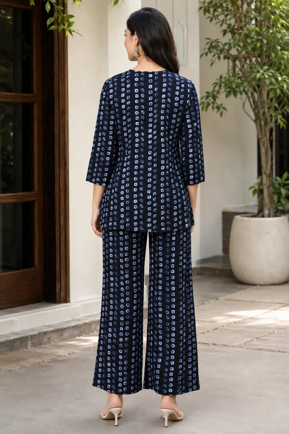 Back view of Rabric navy blue cotton co-ord set for women featuring light blue abstract dot print, short-length top and matching wide-leg pajama