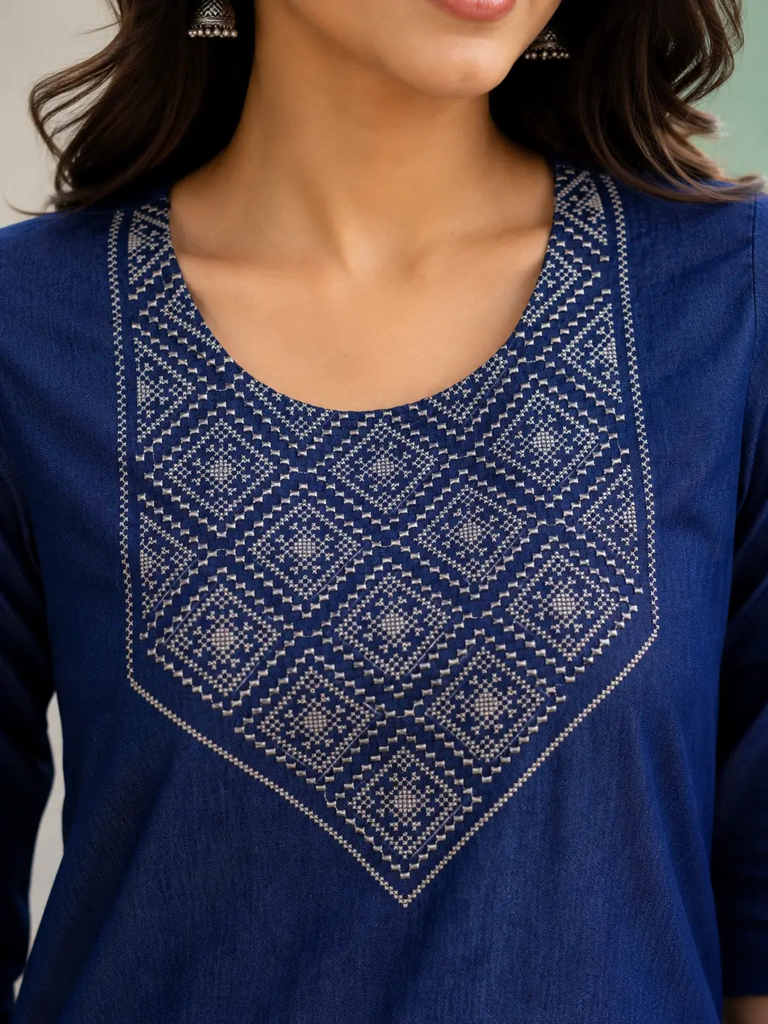 Closeup embroidery neck design of Rabric navy blue cotton short top for women ethnic casual fashion