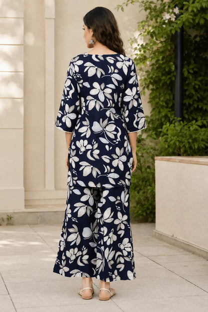 Back view of Rabric navy blue cotton co-ord set with white beige floral print short shirt and matching wide-leg pant