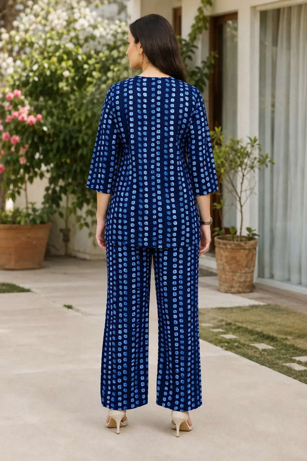 Rabric navy blue cotton printed co-ord set for women featuring light blue geometric dotted print, short top and wide leg pants, back view