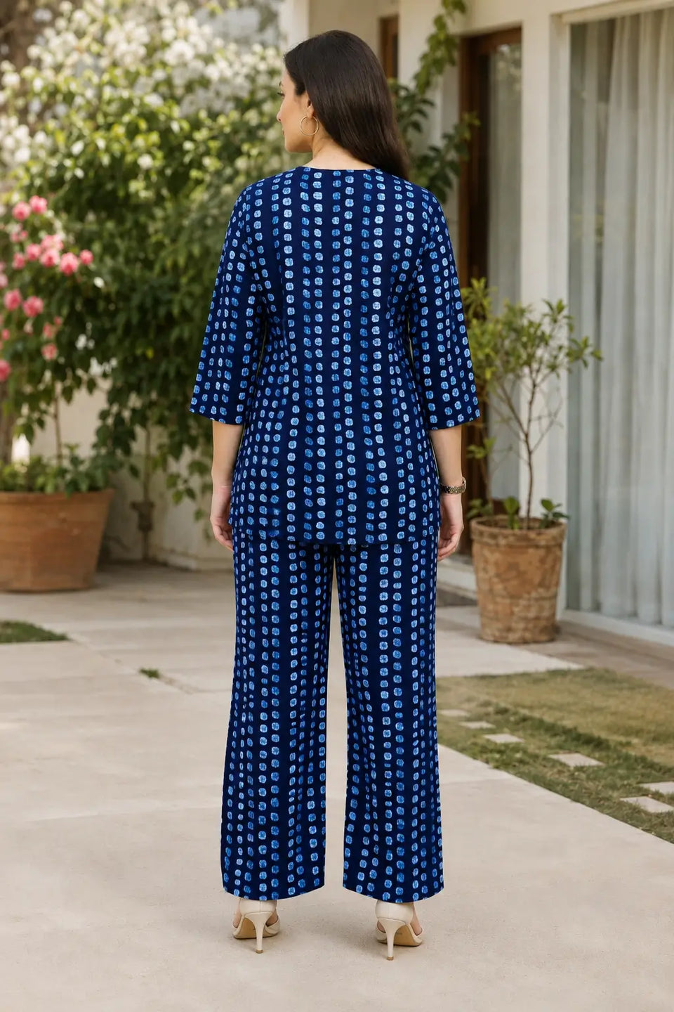 Rabric navy blue cotton printed co-ord set for women featuring light blue geometric dotted print, short top and wide leg pants, back view