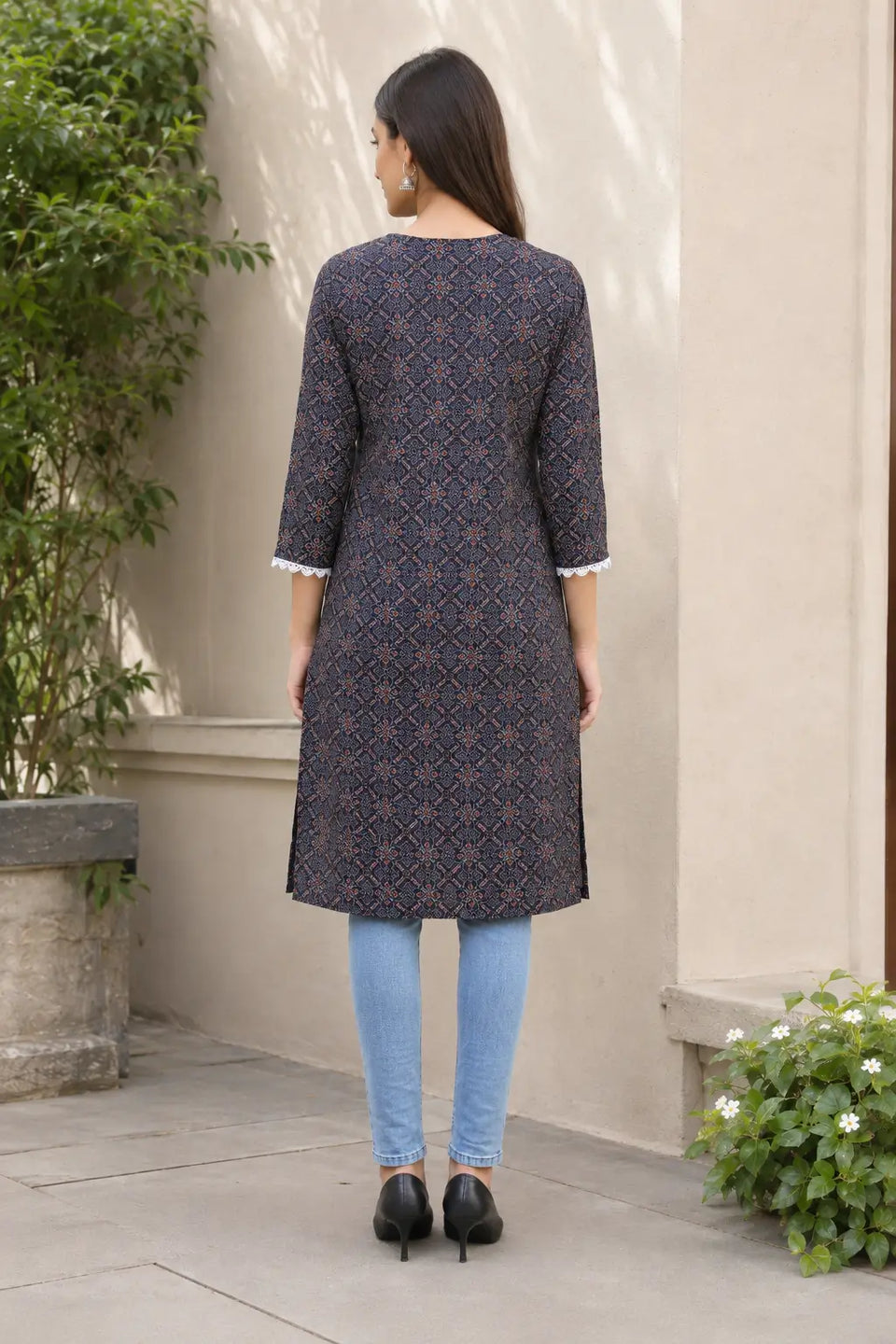 Rabric navy blue cotton straight kurti for women with all over geometric floral print, three quarter sleeves and side slit back view